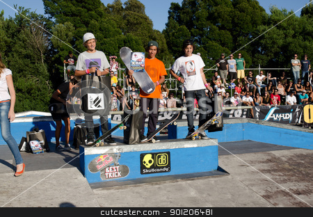 To use this stock image in your creative project, please select the size you need over to the right and click the "Add to Cart" button.
Your downloaded image will come with the Cutcaster watermark removed so don’t worry about the watermark you see on this page. Beginners rank winners stock photo, ILHAVO, PORTUGAL - SEPTEMBER 04: Rui Ferreira, Diogo Braga and Telmo Antunes during the 2nd Stage of the DC Skate Challenge on September 04, 2011 in Ilhavo, Portugal. by Homydesign