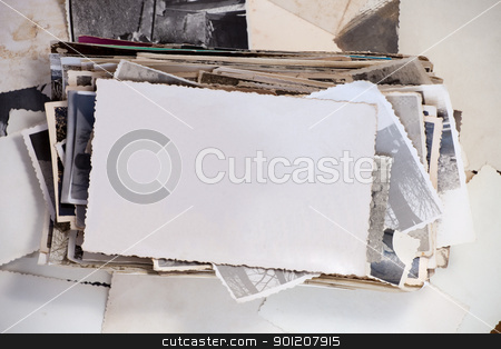 To use this stock image in your creative project, please select the size you need over to the right and click the "Add to Cart" button.
Your downloaded image will come with the Cutcaster watermark removed so don’t worry about the watermark you see on this page. Old photo stock photo, Stack of old photos with one blank photo for your image. by Ints Vikmanis