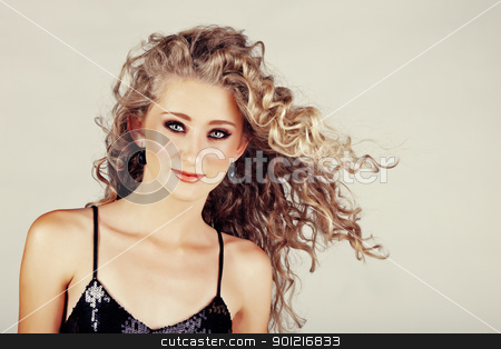 To use this stock image in your creative project, please select the size you need over to the right and click the "Add to Cart" button.
Your downloaded image will come with the Cutcaster watermark removed so don’t worry about the watermark you see on this page. beautiful strawberry blond teenage girl . stock photo, beautiful strawberry blond happy teenage girl with green eyes and long curly hair blowing in wind over grey studio background . by lubavnel