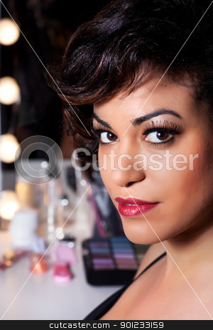 To use this stock image in your creative project, please select the size you need over to the right and click the "Add to Cart" button.
Your downloaded image will come with the Cutcaster watermark removed so don’t worry about the watermark you see on this page. Beautiful Woman with Full Makeup Portrait stock photo, Backstage beauty shoot of a young woman with big brown eyes long eyelashes and cherry red lips. by Rognar