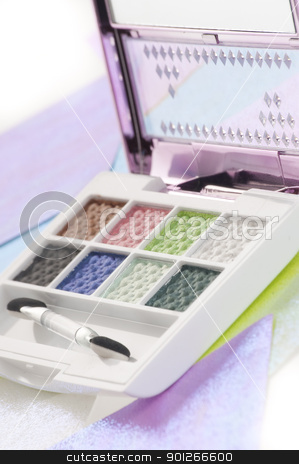 Eye shadow Eye shadow stock photo, Eye shadow kit over colourful papaers background by elemery