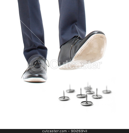 Danger Danger stock photo, A businessman about to step on needles by Lasse Kristensen@gmail.com