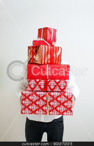 To use this stock image in your creative project, please select the size you need over to the right and click the "Add to Cart" button.
Your downloaded image will come with the Cutcaster watermark removed so don’t worry about the watermark you see on this page. Presenting alot of gifts stock photo, A man presenting several christmas presents by Lasse Kristensen@gmail.com