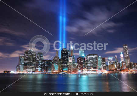 To use this stock image in your creative project, please select the size you need over to the right and click the "Add to Cart" button.
Your downloaded image will come with the Cutcaster watermark removed so don’t worry about the watermark you see on this page. New York City stock photo, Remember September 11. New York City Manhattan panorama view at night with office building skyscrapers skyline illuminated over Hudson River and two light beam in memory of September 11. by rabbit75_cut