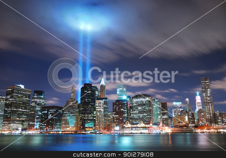 To use this stock image in your creative project, please select the size you need over to the right and click the "Add to Cart" button.
Your downloaded image will come with the Cutcaster watermark removed so don’t worry about the watermark you see on this page. New York City Manhattan at night stock photo, Remember September 11. New York City Manhattan panorama view at night with office building skyscrapers skyline illuminated over Hudson River and two light beam in memory of September 11. by rabbit75_cut