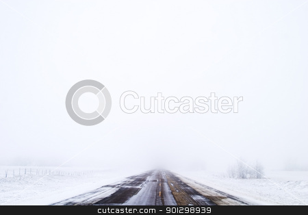 Prairie Road in Fog Prairie Road in Fog stock photo, Prairie highway on a foggy day. by Tyler Olson