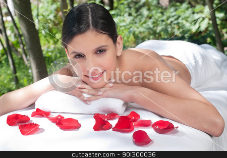 To use this stock image in your creative project, please select the size you need over to the right and click the "Add to Cart" button.
Your downloaded image will come with the Cutcaster watermark removed so don’t worry about the watermark you see on this page. Beautiful young woman relaxing stock photo, Beautiful young woman relaxing at spa in a natural setting by Tyler Olson