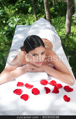 Beautiful young woman at a spa Beautiful young woman at a spa stock photo, High angle view of beautiful young woman at a spa by Tyler Olson
