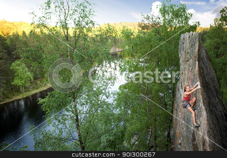To use this stock image in your creative project, please select the size you need over to the right and click the "Add to Cart" button.
Your downloaded image will come with the Cutcaster watermark removed so don’t worry about the watermark you see on this page. Female Climber stock photo, An happy female climber on a steep rock face looks at the camera and smiles - viewed from above. Shallow depth of field is used to isolated the climber with the focus on the head. by Tyler Olson