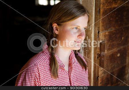 To use this stock image in your creative project, please select the size you need over to the right and click the "Add to Cart" button.
Your downloaded image will come with the Cutcaster watermark removed so don’t worry about the watermark you see on this page. Farm Worker stock photo, A farm girl worker taking a break by Tyler Olson