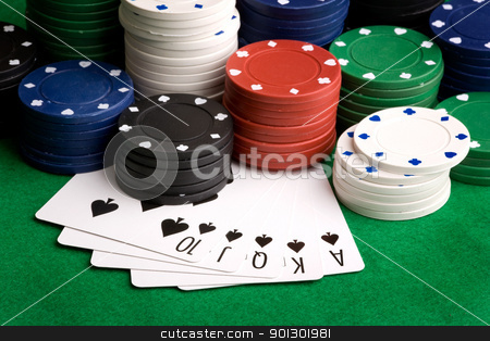 Royal Flush Royal Flush stock photo, A royal flush in spades with poker chips in the background by Tyler Olson