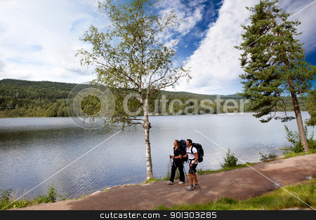 Camping by Lake Camping by Lake stock photo, A couple on a camping trip by a lake by Tyler Olson