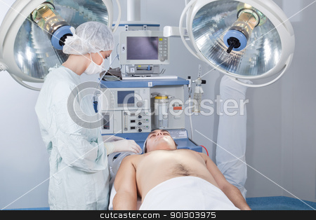 To use this stock image in your creative project, please select the size you need over to the right and click the "Add to Cart" button.
Your downloaded image will come with the Cutcaster watermark removed so don’t worry about the watermark you see on this page. Surgeon checking patient before operation - medical stock photos stock photo, Surgeon checking the patient before operation in operating room - medical stock photos by Tyler Olson