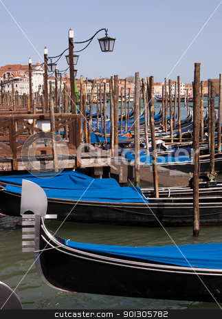 To use this stock image in your creative project, please select the size you need over to the right and click the "Add to Cart" button.
Your downloaded image will come with the Cutcaster watermark removed so don’t worry about the watermark you see on this page. Parked gondolas in Venice, Italy stock photo, Many parked famous gondolas in Venice, Italy by johnnychaos