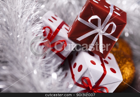 To use this stock image in your creative project, please select the size you need over to the right and click the "Add to Cart" button.
Your downloaded image will come with the Cutcaster watermark removed so don’t worry about the watermark you see on this page. Christmas gifts stock photo, by Sebastian Duda