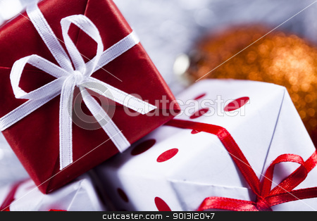 To use this stock image in your creative project, please select the size you need over to the right and click the "Add to Cart" button.
Your downloaded image will come with the Cutcaster watermark removed so don’t worry about the watermark you see on this page. Christmas gifts stock photo, Photography of baubles and gift connected with Christmas time and Christmas tree. by Sebastian Duda