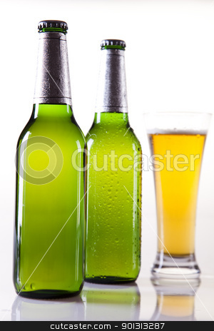 Beer bottle and glass Beer bottle and glass stock photo, Beer collection, glass in studio. by Sebastian Duda