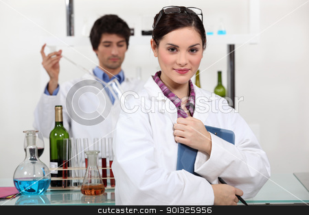 People working in a wine laboratory People working in a wine laboratory stock photo, People working in a wine laboratory by photography33