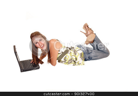 To use this stock image in your creative project, please select the size you need over to the right and click the "Add to Cart" button.
Your downloaded image will come with the Cutcaster watermark removed so don’t worry about the watermark you see on this page. Smiling with laptop. stock photo, A young tall woman lying on the floor and typing in her laptop, in jeans
high heels and long brunette hair, for white background.
by Horst Petzold