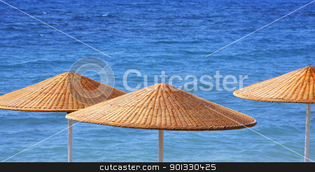 Beach Umbrelas Beach Umbrelas stock photo, Beach umbrellas close up by Georgios Kollidas