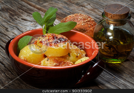 To use this stock image in your creative project, please select the size you need over to the right and click the "Add to Cart" button.
Your downloaded image will come with the Cutcaster watermark removed so don’t worry about the watermark you see on this page. potatoes au gratin stock photo, baked potatoes au gratin on a earthen bowl by maxg71