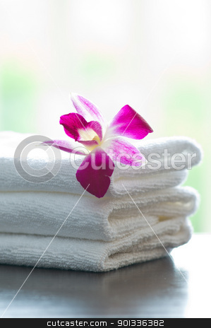 Spa towels and orchid flowers Spa towels and orchid flowers stock photo, Spa towels and orchid flowers in front of a bright background by Ulrich Schade