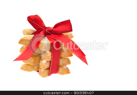 To use this stock image in your creative project, please select the size you need over to the right and click the "Add to Cart" button.
Your downloaded image will come with the Cutcaster watermark removed so don’t worry about the watermark you see on this page. Stack of Christmas cookies stock photo, Stack of Christmas cookies wrapped in red ribbon over white by Ulrich Schade