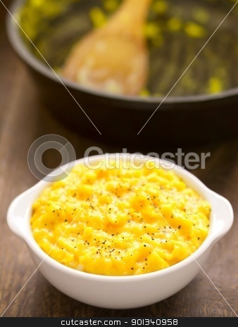 Scrambled eggs scrambled eggs stock photo, close up of a bowl of scrambled eggs by zkruger