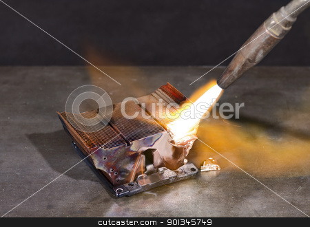 Melting heat sink melting heat sink stock photo, melting heat sink and welding torch on metallic ground by prill