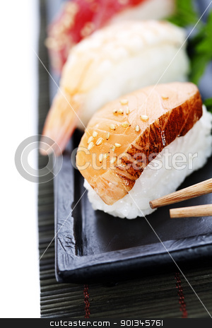 To use this stock image in your creative project, please select the size you need over to the right and click the "Add to Cart" button.
Your downloaded image will come with the Cutcaster watermark removed so don’t worry about the watermark you see on this page. sushi stock photo, set of japanese sushi with chopsticks over white by klenova