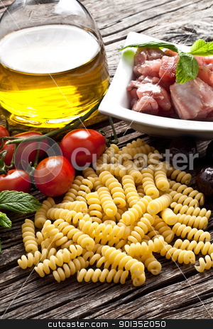 To use this stock image in your creative project, please select the size you need over to the right and click the "Add to Cart" button.
Your downloaded image will come with the Cutcaster watermark removed so don’t worry about the watermark you see on this page. Italian Fusilli pasta with swordfish ingredients stock photo, Italian Fusilli pasta with swordfish, olive and raw tomato ingredients by maxg71