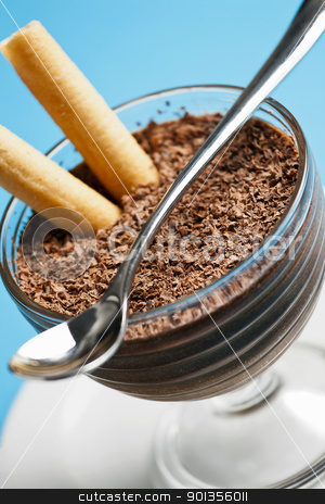 To use this stock image in your creative project, please select the size you need over to the right and click the "Add to Cart" button.
Your downloaded image will come with the Cutcaster watermark removed so don’t worry about the watermark you see on this page. Close-up of a Chocolate Mousse Dessert stock photo, Close-up photograph of a chocolate mousse dessert set on a white plate on a blue background by mpessaris