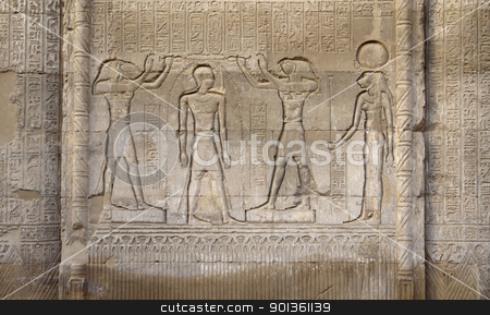 Stone relief at the Esana Temple stone relief at the Esana Temple stock photo, architectural detail of the historic Esana Temple in Egypt (Africa) showing a stone relief with some figures and hieroglyphics by prill