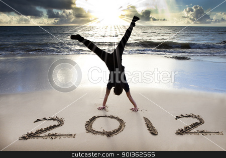 Happy new year 2012 on the beach with sunrise happy new year 2012 on the beach with sunrise stock photo, happy new year 2012 on the beach with sunrise by tomwang