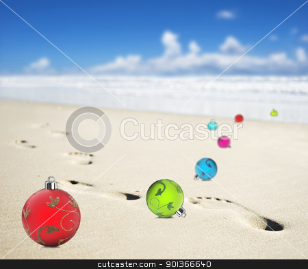 To use this stock image in your creative project, please select the size you need over to the right and click the "Add to Cart" button.
Your downloaded image will come with the Cutcaster watermark removed so don’t worry about the watermark you see on this page. Christmas baubles on a beach with footprints stock photo, Christmas baubles on a beach with footprints by tish1