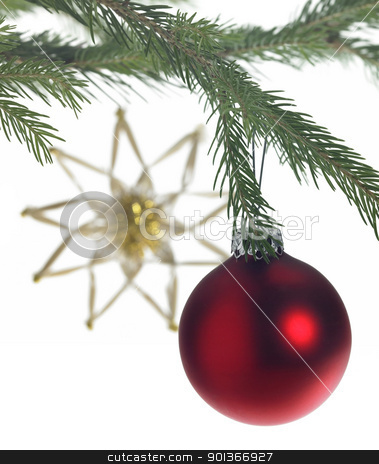 Decorative theme with red christmas bauble decorative theme with red christmas bauble stock photo, Studio photography of some christmas decoration with red christmas bauble on fir branch and a blurry straw star in the back by prill
