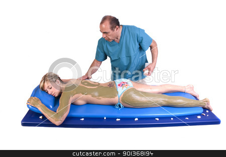 Woman having Massge and seaweed body treatment Woman having Massge and seaweed body treatment stock photo, Woman getting Massage and seaweed treatment by Jeffrey Banke