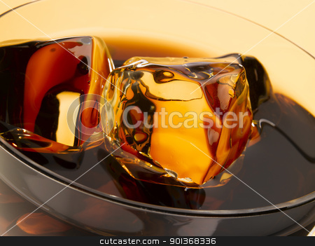To use this stock image in your creative project, please select the size you need over to the right and click the "Add to Cart" button.
Your downloaded image will come with the Cutcaster watermark removed so don’t worry about the watermark you see on this page. Ice cubes in cola stock photo, Close up of ice cubes floating in a glass of cola by Han van Vonno