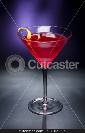 To use this stock image in your creative project, please select the size you need over to the right and click the "Add to Cart" button.
Your downloaded image will come with the Cutcaster watermark removed so don’t worry about the watermark you see on this page. Cosmopolitan cocktail with lemon garnish stock photo, Cosmopolitan cocktail with lemon garnish in front of a black blue background by Ulrich Schade