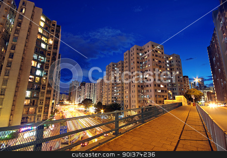 Modern urban city at night with freeway traffic modern urban city at night with freeway traffic stock photo, modern urban city at night with freeway traffic by Keng po Leung