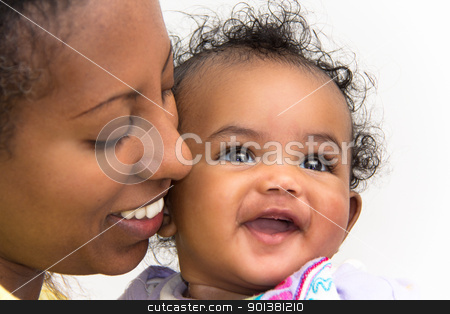 To use this stock image in your creative project, please select the size you need over to the right and click the "Add to Cart" button.
Your downloaded image will come with the Cutcaster watermark removed so don’t worry about the watermark you see on this page. Mother and daugher stock photo, A mother kissing her smiling baby girl on the cheeks by derejeb