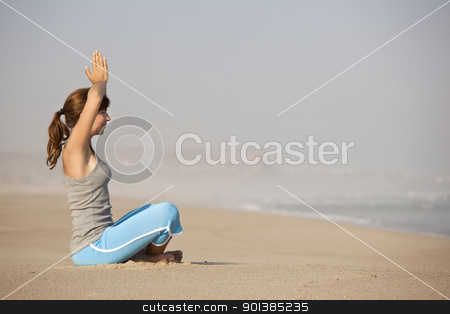 To use this stock image in your creative project, please select the size you need over to the right and click the "Add to Cart" button.
Your downloaded image will come with the Cutcaster watermark removed so don’t worry about the watermark you see on this page. Yoga time stock photo, Beautiful young woman on the beach doing yoga exercises by ikostudio