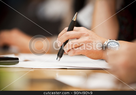 To use this stock image in your creative project, please select the size you need over to the right and click the "Add to Cart" button.
Your downloaded image will come with the Cutcaster watermark removed so don’t worry about the watermark you see on this page. Hand with a pen stock photo, Human hand holding a pencil on a table by Anne-Louise Quarfoth