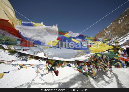 Praying flags Praying flags stock photo, Tibetan praying flags floating on the Thorong-la pass at 5416m by Paul Prescott