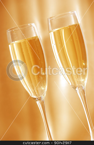 Two glasses of champagne Two glasses of champagne stock photo, Two glasses of champagne against golden background by sutike