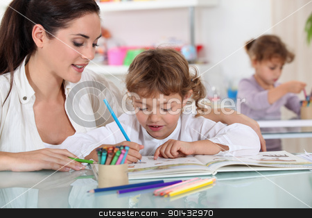 To use this stock image in your creative project, please select the size you need over to the right and click the "Add to Cart" button.
Your downloaded image will come with the Cutcaster watermark removed so don’t worry about the watermark you see on this page. Woman and child colouring at a desk stock photo, Woman and child colouring at a desk by photography33