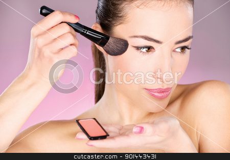 Woman applying cosmetic powder brush woman applying cosmetic powder brush stock photo, pretty woman applying cosmetic powder brush by iMarin