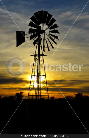 Wind Pump Wind Pump stock photo, Wind Pump at sunrise with clouds by Riaan Roux
