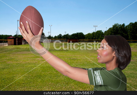 Black Woman Football Player Black Woman Football Player stock photo, Beautiful black African American woman playing football by Robert Byron