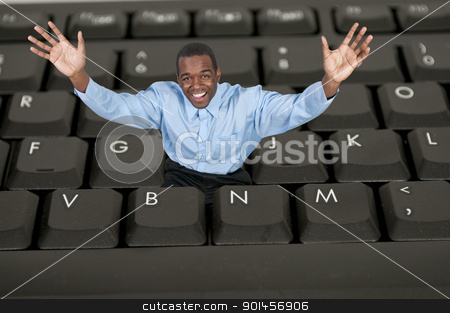 To use this stock image in your creative project, please select the size you need over to the right and click the "Add to Cart" button.
Your downloaded image will come with the Cutcaster watermark removed so don’t worry about the watermark you see on this page. Man Using Computer stock photo, A black African American man computer user by Robert Byron